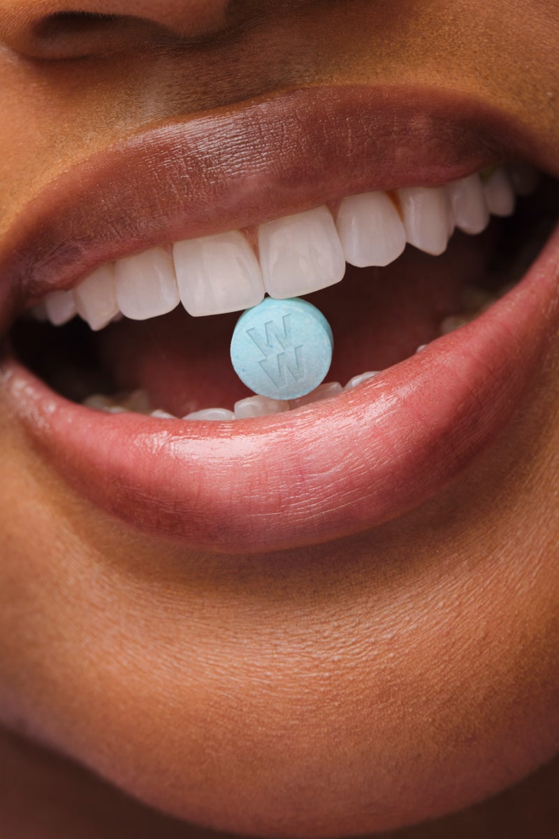 WeightWatchers pill photographed in a consumer's hand
